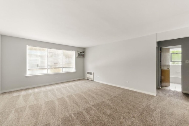 1111 N Harlem Ave Unit 1C, Oak Park, IL 60302 - empty room with carpet and a wall unit AC