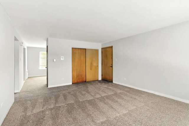1111 N Harlem Ave Unit 1C, Oak Park, IL 60302 - unfurnished bedroom with carpet flooring and a closet