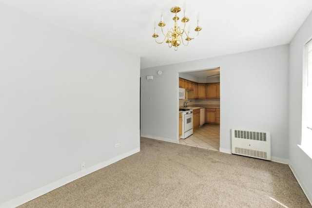 1111 N Harlem Ave Unit 1C, Oak Park, IL 60302 - unfurnished living room featuring radiator, a chandelier, and light carpet