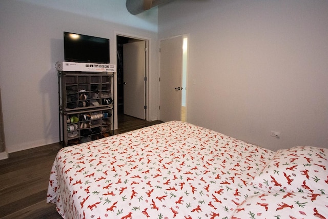 50 E 16th St Unit 311, Chicago, IL 60616 - bedroom with dark wood-style floors and ceiling fan