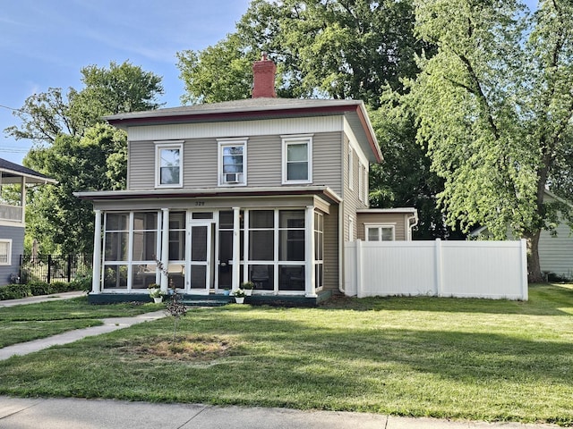 320 Congress St, Ottawa, IL 61350 - view of front of house featuring a sunroom and a chimney