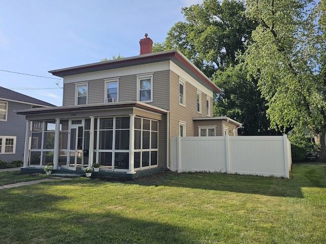 320 Congress St, Ottawa, IL 61350 - back of property featuring a chimney and a sunroom