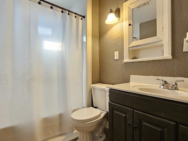320 Congress St, Ottawa, IL 61350 - bathroom with a textured wall, vanity, and shower / bathtub combination with curtain