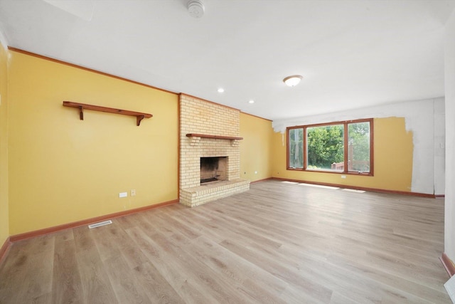 3057 201st Pl, Lynwood, IL 60411 - unfurnished living room featuring light wood-style floors, a fireplace, and recessed lighting