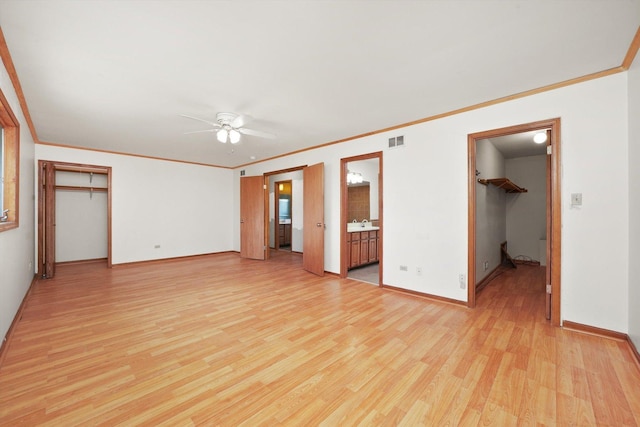 3057 201st Pl, Lynwood, IL 60411 - unfurnished living room with ceiling fan, light wood finished floors, and crown molding