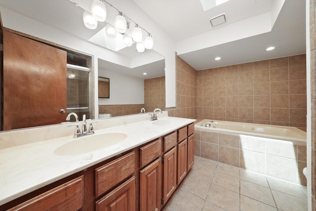 3057 201st Pl, Lynwood, IL 60411 - bathroom featuring a garden tub, double vanity, tile walls, tile patterned flooring, and a shower stall