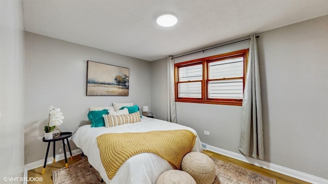 2701 S Hillock Ave, Chicago, IL 60608 - bedroom with wood finished floors and baseboards