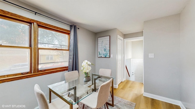 2701 S Hillock Ave, Chicago, IL 60608 - dining room with light wood-type flooring and baseboards