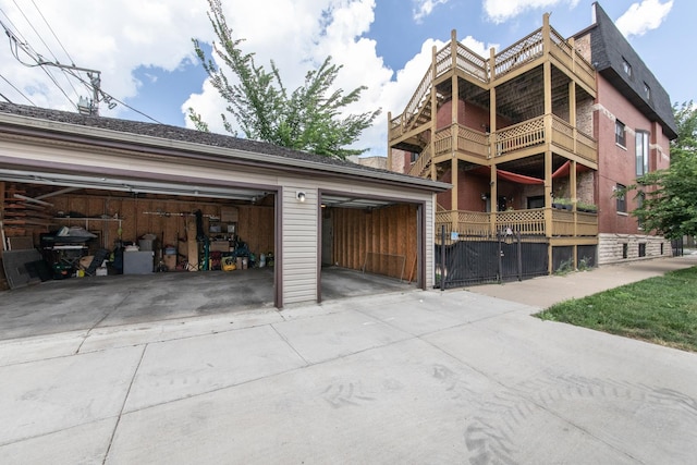 2901 W Washington Blvd Unit 2, Chicago, IL 60612 - view of property featuring a garage and concrete driveway