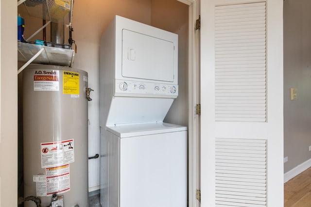 2901 W Washington Blvd Unit 2, Chicago, IL 60612 - laundry area featuring water heater, stacked washer and clothes dryer, and wood finished floors