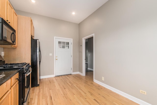 2901 W Washington Blvd Unit 2, Chicago, IL 60612 - kitchen with appliances with stainless steel finishes, light wood-type flooring, recessed lighting, dark stone countertops, and light brown cabinetry