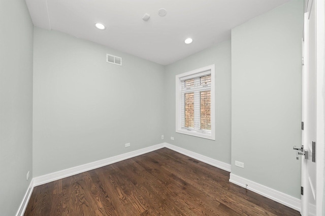 2040 N Laporte Ave, Chicago, IL 60639 - empty room with dark wood-style flooring and recessed lighting