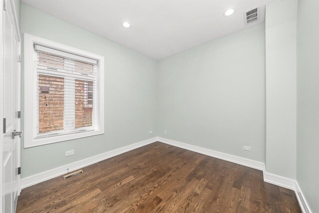 2040 N Laporte Ave, Chicago, IL 60639 - spare room with dark wood finished floors and recessed lighting