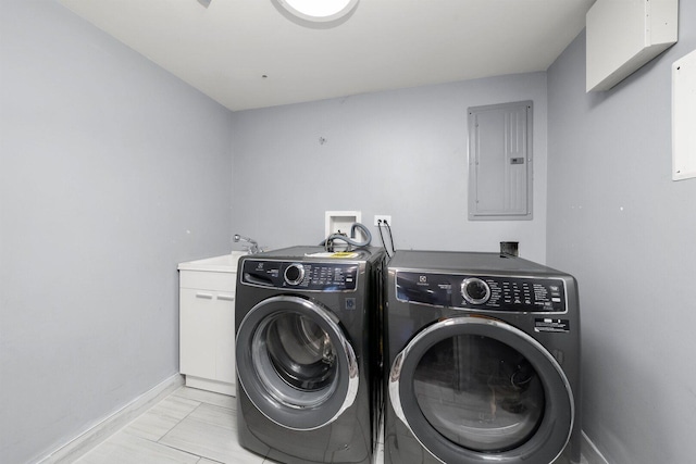 2040 N Laporte Ave, Chicago, IL 60639 - laundry area with electric panel, washing machine and clothes dryer, and cabinet space