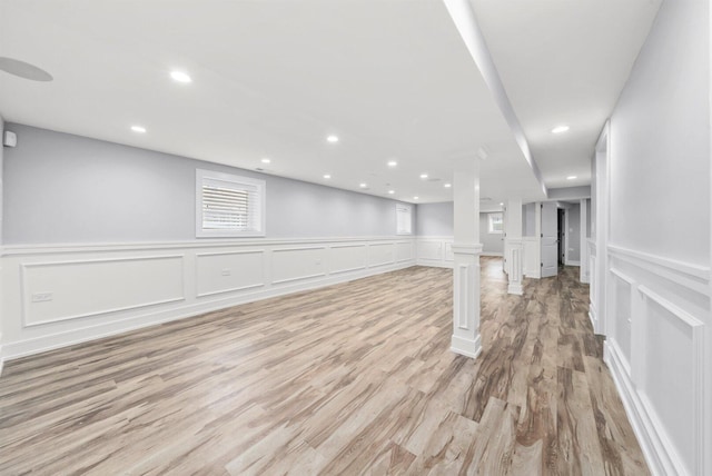 2040 N Laporte Ave, Chicago, IL 60639 - basement with a decorative wall, light wood-style flooring, wainscoting, and recessed lighting