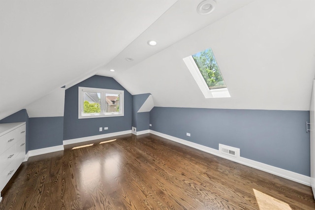 2040 N Laporte Ave, Chicago, IL 60639 - additional living space featuring a skylight, lofted ceiling, wood finished floors, and recessed lighting