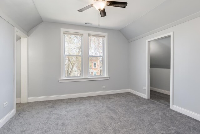 6132 S Justine St, Chicago, IL 60636 - additional living space featuring vaulted ceiling, carpet flooring, and a ceiling fan