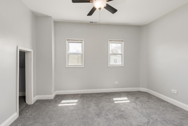 6132 S Justine St, Chicago, IL 60636 - carpeted empty room with ceiling fan and baseboards