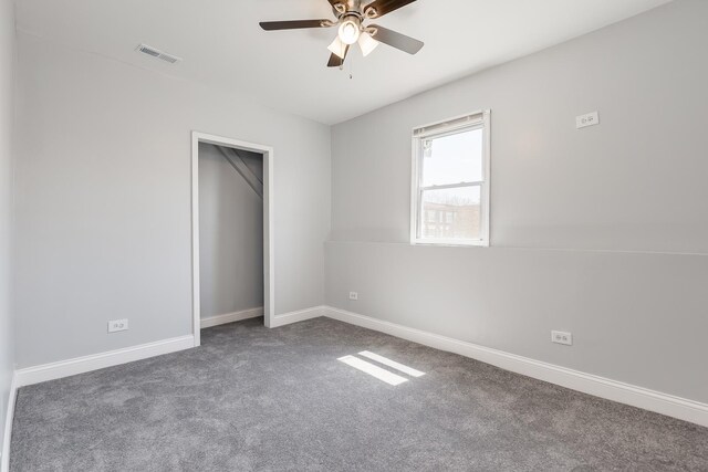 6132 S Justine St, Chicago, IL 60636 - unfurnished bedroom featuring carpet floors, a ceiling fan, and a closet