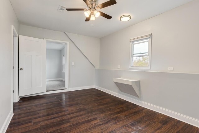 6132 S Justine St, Chicago, IL 60636 - spare room featuring dark wood finished floors and ceiling fan