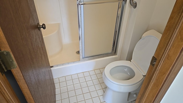 906 E Steger Rd Unit 5, Crete, IL 60417 - bathroom featuring a stall shower and tile patterned flooring