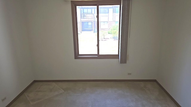 906 E Steger Rd Unit 5, Crete, IL 60417 - empty room featuring baseboards and carpet floors