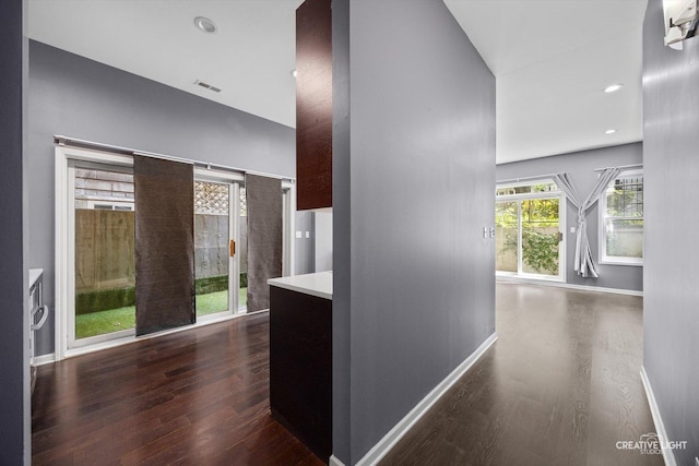 3312 W Beach Ave Unit 1, Chicago, IL 60651 - hall with dark wood-style floors and recessed lighting