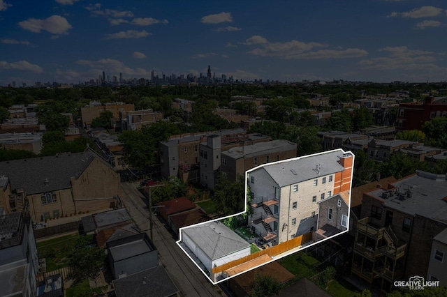 3312 W Beach Ave Unit 1, Chicago, IL 60651 - aerial view of property's location featuring property parcel outlined and skyline