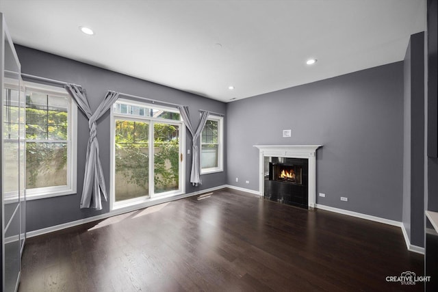 3312 W Beach Ave Unit 1, Chicago, IL 60651 - unfurnished living room with a fireplace with flush hearth, wood finished floors, and recessed lighting