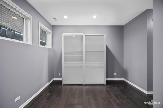 3312 W Beach Ave Unit 1, Chicago, IL 60651 - empty room with wood finished floors and recessed lighting