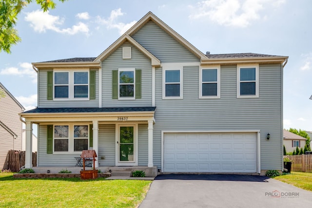 39837 N Torry Ln, Beach Park, IL 60083 - traditional-style home featuring covered porch, asphalt driveway, and a garage