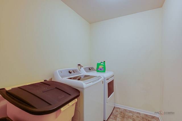 39837 N Torry Ln, Beach Park, IL 60083 - laundry room with washing machine and clothes dryer and baseboards