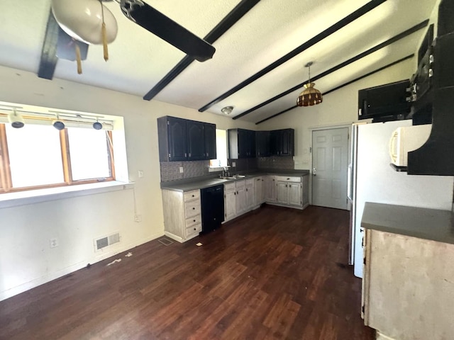 10440 Hussung Dr, Rock Falls, IL 61071 - kitchen featuring dishwasher, dark wood finished floors, plenty of natural light, and decorative backsplash