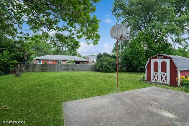 305 Milburn Ave, Crete, IL 60417 - fenced backyard featuring a storage unit