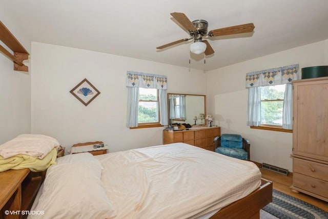 305 Milburn Ave, Crete, IL 60417 - bedroom featuring wood finished floors and a ceiling fan