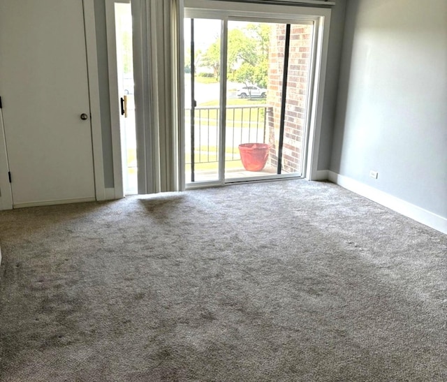 14949 Lakeview Dr Unit 204, Orland Park, IL 60462 - carpeted empty room with baseboards