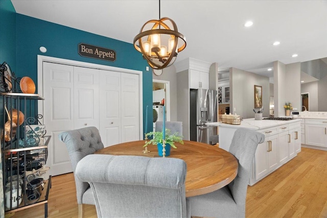 7488 Bittersweet Dr, Gurnee, IL 60031 - dining room featuring light wood finished floors, a chandelier, and recessed lighting