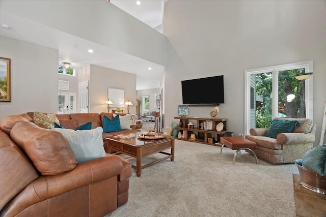 7488 Bittersweet Dr, Gurnee, IL 60031 - living area with plenty of natural light, a towering ceiling, carpet, and recessed lighting