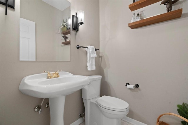 7488 Bittersweet Dr, Gurnee, IL 60031 - bathroom featuring toilet and baseboards