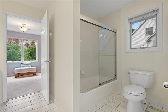 7488 Bittersweet Dr, Gurnee, IL 60031 - bathroom with tile patterned floors and shower / bath combination with glass door