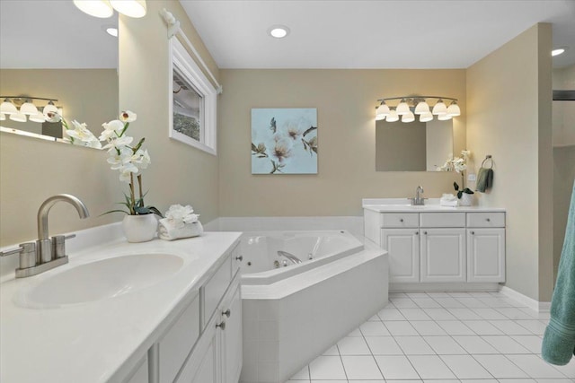 7488 Bittersweet Dr, Gurnee, IL 60031 - bathroom with two vanities, a jetted tub, tile patterned flooring, and recessed lighting