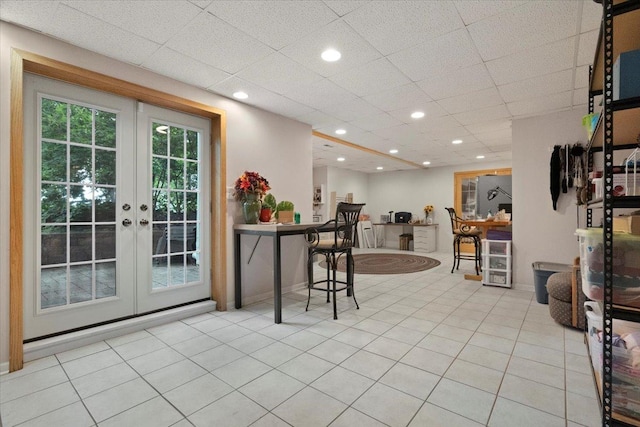 7488 Bittersweet Dr, Gurnee, IL 60031 - kitchen with french doors, recessed lighting, and light tile patterned flooring
