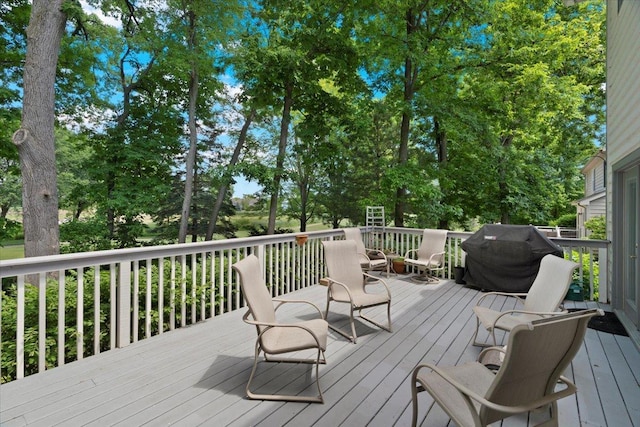 7488 Bittersweet Dr, Gurnee, IL 60031 - wooden deck featuring grilling area and view of scattered trees