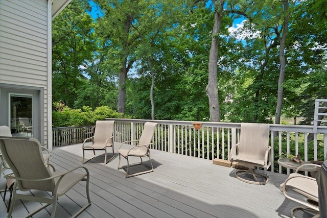 7488 Bittersweet Dr, Gurnee, IL 60031 - wooden deck with view of scattered trees