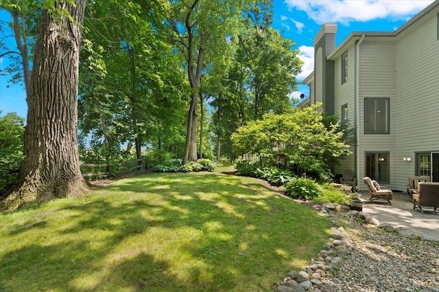 7488 Bittersweet Dr, Gurnee, IL 60031 - view of green lawn featuring a patio area