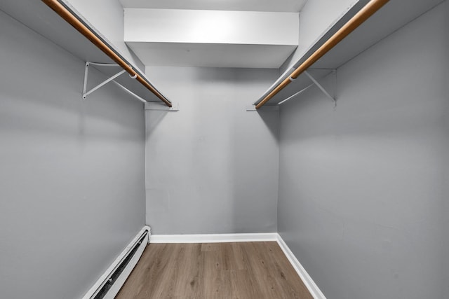 6 E Dundee Quarter Dr Unit 101, Palatine, IL 60074 - spacious closet with wood finished floors and a baseboard heating unit