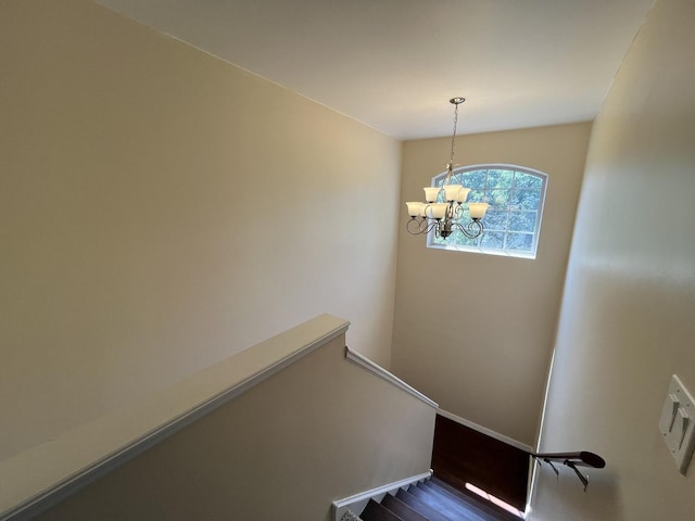 9425 Harrison St Unit 5-714, Des Plaines, IL 60016 - staircase with a chandelier and wood finished floors