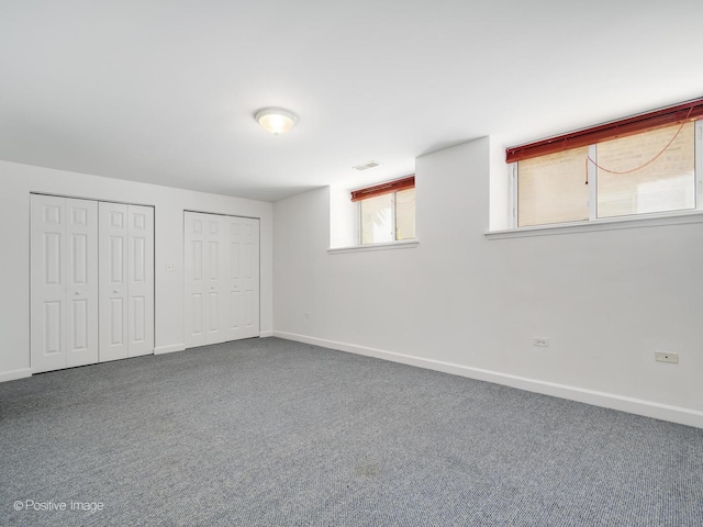 4411 N Beacon St Unit G, Chicago, IL 60640 - unfurnished bedroom featuring two closets and carpet