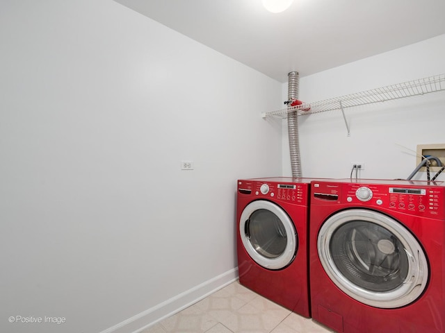 4411 N Beacon St Unit G, Chicago, IL 60640 - laundry room with washing machine and dryer and baseboards