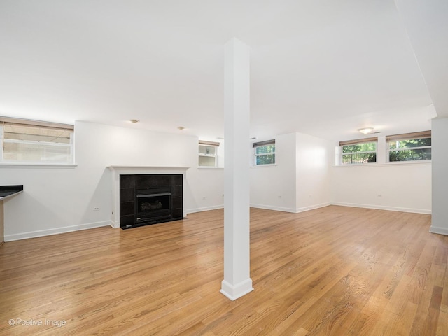 4411 N Beacon St Unit G, Chicago, IL 60640 - unfurnished living room featuring a fireplace and light wood finished floors
